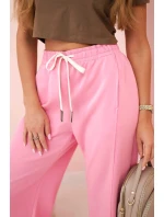 Máslové kalhoty zavazované v pase růžový Máslové kalhoty zavazované v pase růžový
