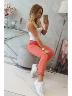 Tmavě meruňkové džínové kalhoty Tmavě meruňkové džínové kalhoty