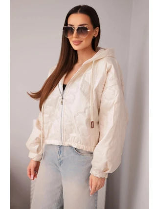 Dámská prošívaná bunda s kapucí a ozdobným květinovým ražením béžová