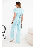 Dámský komplet z materiálu masełko s krátkým rukávem a kalhotami se širokou nohavicí mentolový Dámský komplet z materiálu masełko s krátkým rukávem a kalhotami se širokou nohavicí mentolový