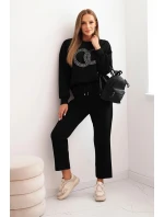 Dámský komplet z viskózy s ozdobným motivem a kalhotami černá Dámský komplet z viskózy s ozdobným motivem a kalhotami černá
