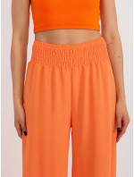Oranžové široké dámské kalhoty s gumou v pase (8390)