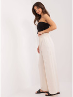 Široké dámské kalhoty v krémové barvě s gumou v pase (8390)