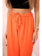 Kalhoty s širokým pasem tmavě oranžová Kalhoty s širokým pasem tmavě oranžová