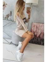 Rukojeť s béžovými šaty s potiskem