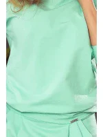 Dámské teplákové šaty v mátové barvě s výstřihem na zádech model 5917732