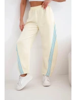 Dámské máslové kalhoty z viskózy s lampasem žluté