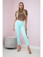 Barevné džínové kalhoty s mátovou mašlí Barevné džínové kalhoty s mátovou mašlí