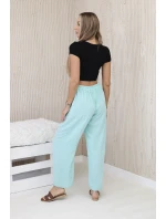 Kalhoty se širokými nohavicemi mincovna Kalhoty se širokými nohavicemi mincovna