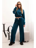 Dámská souprava z veluru s širokými nohavicemi a mikinou s kapucí chabrová