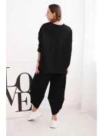 Dámský teplákový komplet z silnějšího materiálu se širokými nohavicemi černý