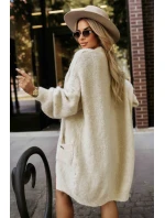 628-1 Módní oversize svetr s ozdobnou broží a praktickými kapsami - béžový