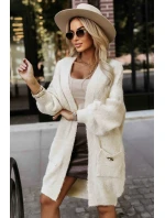 628-1 Módní oversize svetr s ozdobnou broží a praktickými kapsami - béžový