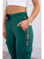 Zelené nákladní kalhoty
