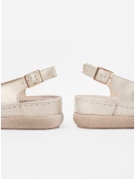 Trendy dámské zlaté sandály na plochém podpatku Trendy dámské zlaté sandály na plochém podpatku