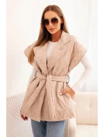 Dámská prošívaná vesta s páskem a širokým límcem tmavě béžová Dámská prošívaná vesta s páskem a širokým límcem tmavě béžová