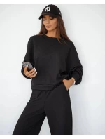 Černý dámský komplet s vaflovou strukturou - mikina a kalhoty (821108) Černý dámský komplet s vaflovou strukturou - mikina a kalhoty (821108)