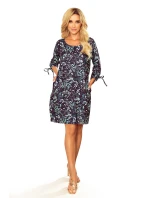 SOPHIE - Pohodlné dámské oversize šaty se vzorem listů v mátové barvě na tmavém pozadí 281-4