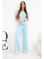 Dámský komplet z materiálu masełko s krátkým rukávem a kalhotami se širokou nohavicí mentolový Dámský komplet z materiálu masełko s krátkým rukávem a kalhotami se širokou nohavicí mentolový