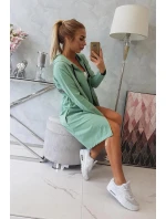 Tmavě mátový plášť s dlouhými zády