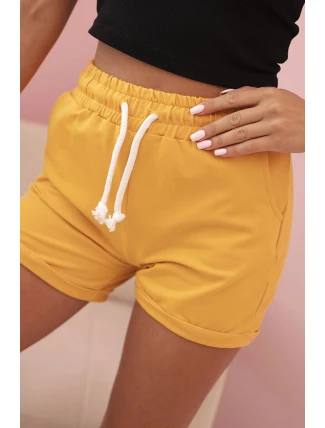Dámské bavlněné šortky s gumou a šněrováním v pase hořčicové Dámské bavlněné šortky s gumou a šněrováním v pase hořčicové