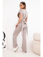 Dámský komplet z maslového materiálu s halenkou s krátkým rukávem a kalhotami se širokou nohavicí fango