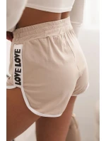 Dámské bavlněné šortky s elastickým pasem a sportovním lemem béžové
