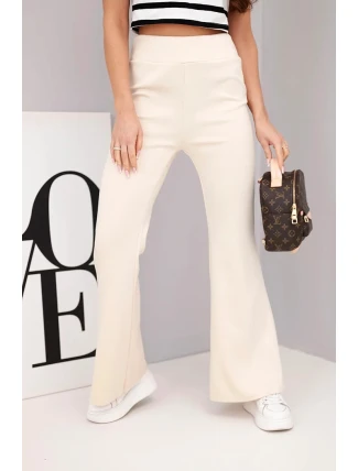 Dámské kalhoty máslo s rozšiřující se nohavicí béžové