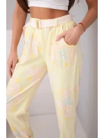 Dámské viskózové kalhoty s květinovým vzorem a páskem žluté