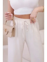 Viskózové kalhoty se širokými nohavicemi světle béžová Viskózové kalhoty se širokými nohavicemi světle béžová
