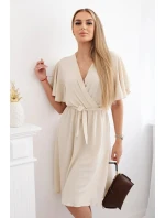 Šaty s vrstveným výstřihem béžový