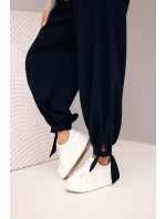 Dámské kalhoty s širokým nohavicí a vázáním dole modré