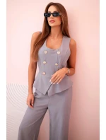 Dámská kombinéza bez rukávů s širokými nohavicemi a ozdobnými knoflíky šedý Dámská kombinéza bez rukávů s širokými nohavicemi a ozdobnými knoflíky šedý