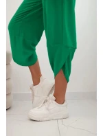 Kalhoty se širokými nohavicemi a kapsami zelený