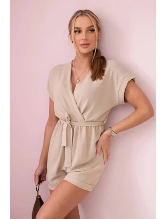 Krátký overal zavazovaný v pase béžový Krátký overal zavazovaný v pase béžový