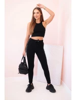 Dámské teplákové kalhoty s lampasem a šňůrkou v pase černé Dámské teplákové kalhoty s lampasem a šňůrkou v pase černé
