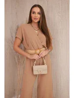 Kombinéza s ozdobným páskem v pase Velbloud