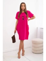 Šaty s kapsami a přívěskem fuchsie