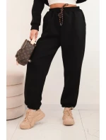 Dámský teplákový komplet zateplený z bavlny s kapucí černý Dámský teplákový komplet zateplený z bavlny s kapucí černý