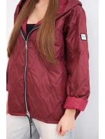 Dámská jarní prošívaná bunda s kapucí a zipem švestková