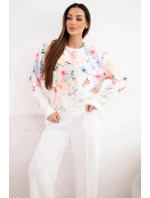 Dámský máslový viskózový komplet s květinovým vzorem a širokými nohavicemi bílý