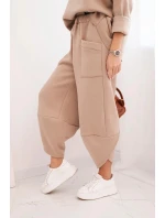 Dámská souprava z teplejšího materiálu se širokými nohavicemi béžová