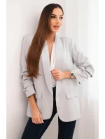 Šedé sako s klopami elegantní