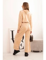 Dámská souprava z veluru se širokými nohavicemi a mikinou s kapucí béžová