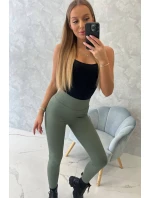 Tmavě mátové pruhované legíny