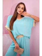 Viskózový komplet se zlatým lemováním mincovna