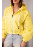 Dámská prošívaná bunda s kapucí a ozdobným květinovým ražením žlutá