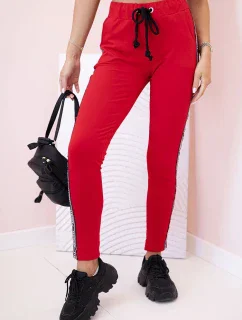 Dámské teplákové kalhoty s lampasem a šňůrkou v pase červené