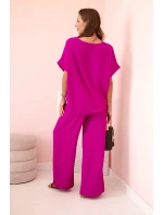 Dámský komplet z viskózy s ozdobným květem a širokými kalhotami - tmavě fialový Dámský komplet z viskózy s ozdobným květem a širokými kalhotami - tmavě fialový