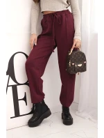 Elegantní dámské kalhoty s vysokým pasem a vázáním v pase bordó